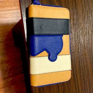 Beautiful TOUs leather wallet.